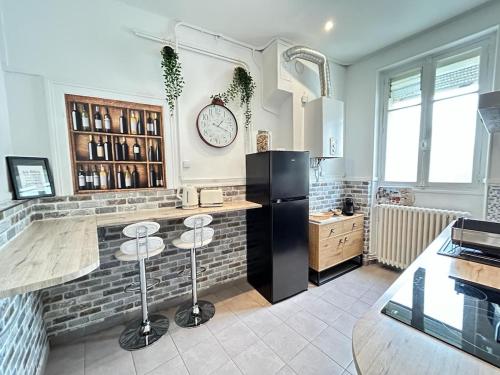 Кухня или мини-кухня в Le cœur de Reims magnifique 3 chambres au centre
