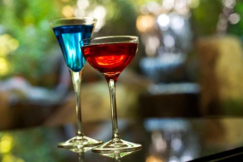 two wine glasses sitting on top of a table at ANA Crowne Plaza Hiroshima by IHG in Hiroshima