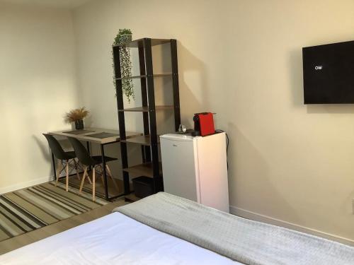 Televisyen dan/atau pusat hiburan di Apartamento Studio 51