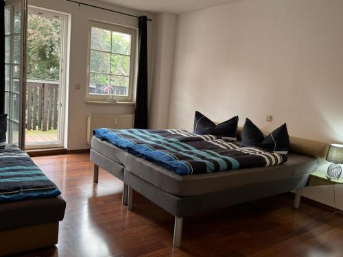 Katil atau katil-katil dalam bilik di Apartment am Domplatz
