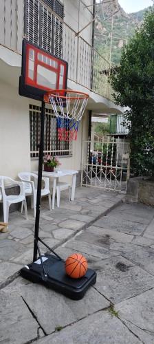 a basketball hoop and a ball on a trampoline at Casa Eva Roreto in Roure Turin