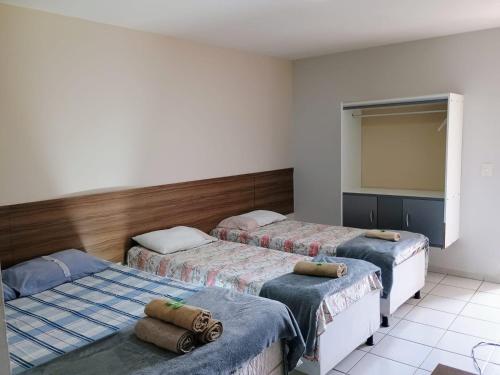 Postel nebo postele na pokoji v ubytování Cantinho do Brejo Pousada