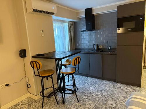Η κουζίνα ή μικρή κουζίνα στο Loft Garden on A