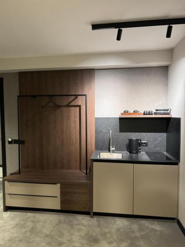 Η κουζίνα ή μικρή κουζίνα στο Five Apartments