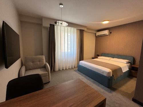 Ένα ή περισσότερα κρεβάτια σε δωμάτιο στο Five Apartments