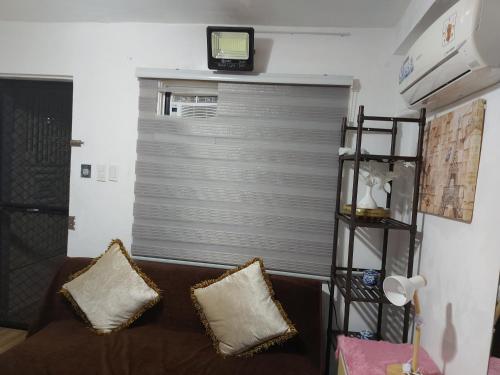 Ruang duduk di Studio room Calapan