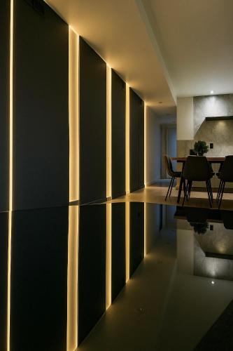a dining room with a table and some chairs at 3 KING beds Free Parking Modern Luxe Escape in Pittsburgh