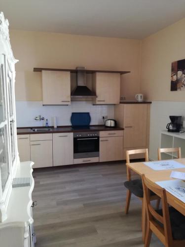 Η κουζίνα ή μικρή κουζίνα στο Ferienwohnung Leonie mit Sauna