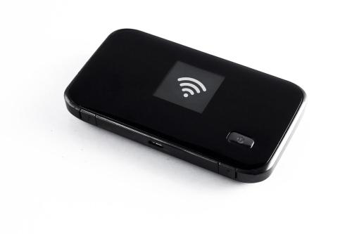 a black cell phone with a wifi symbol on it at Attico a Caslano - Happy Rentals in Caslano