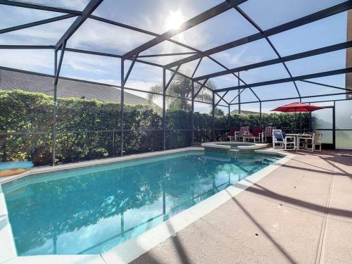 Screened pool & spa resort access near Disney photo 31