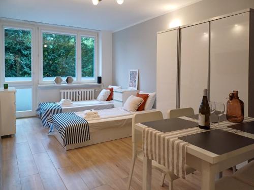 En eller flere senge i et værelse på Apartament Fale Falowca