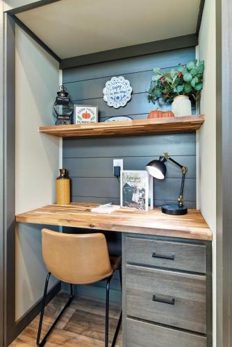a home office with a desk and a chair at Pigeon Forge Landing RV Resort in Pigeon Forge