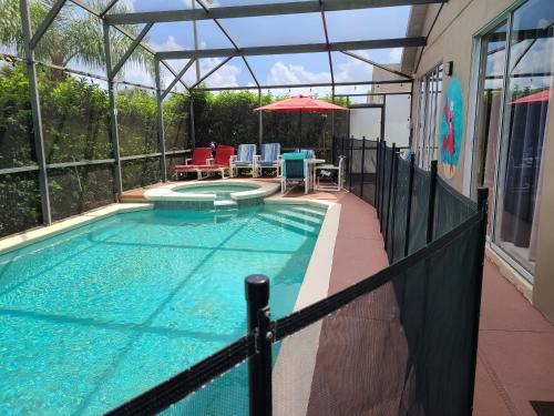 Screened pool & spa resort access near Disney photo 65