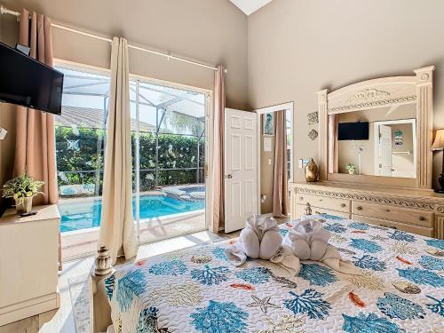 Screened pool & spa resort access near Disney photo 33