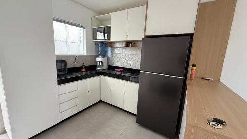 Nhà bếp/bếp nhỏ tại casa com suite e banheiro social