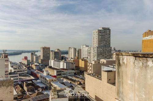 an aerial view of a city with tall buildings at TCO - Apartamentos no Centro Histórico Porto Alegre/RS in Porto Alegre