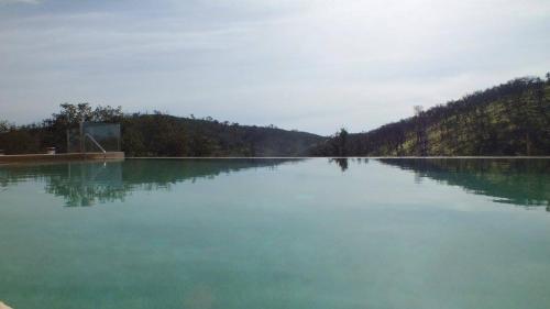 a large body of water with trees in the background at Monte Corgo da Vaca in Sabóia