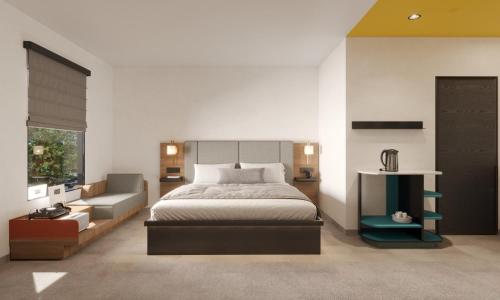 un dormitorio con una cama y un sofá en Boundary By Terra Vi Durango, en Durango