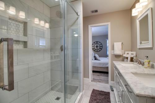 a bathroom with a walk in shower and a sink at Low Country Get Away 3 bed 2 bath Home in Bluffton