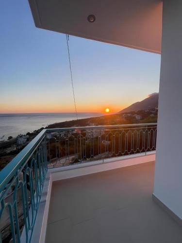 a balcony with a view of the ocean at Endless blue Apartments in Dhërmi