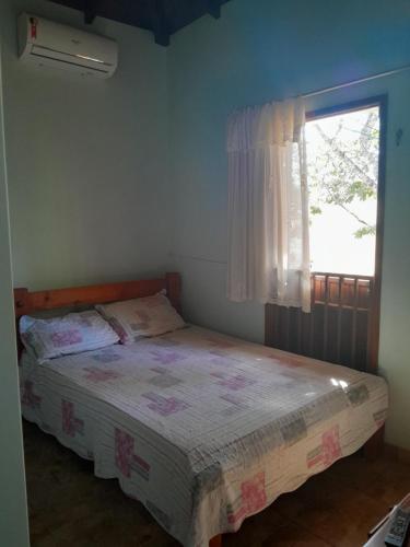 Una cama o camas en una habitación de Agnus Dei