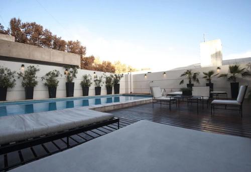 Bazén v ubytování Lujoso Departamento en Edificio de 1º nivel nebo v jeho okolí