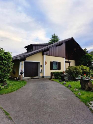 a house with a driveway in front of it at Feriendomizil 219 in Allerheiligen bei Wildon