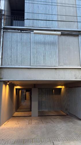 a building with a walkway in front of it at Cilveti 468 departamento con cochera, excelente ubicación in Rosario