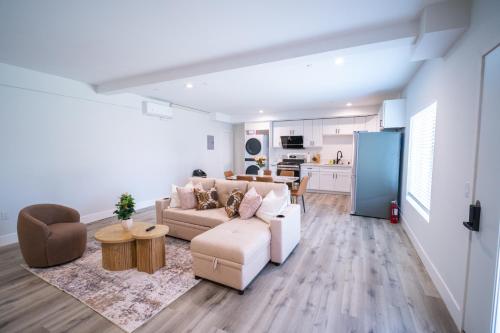 a living room with a couch and a table at Modern 2BR2BA Home Near USC Walk to Campus in Los Angeles