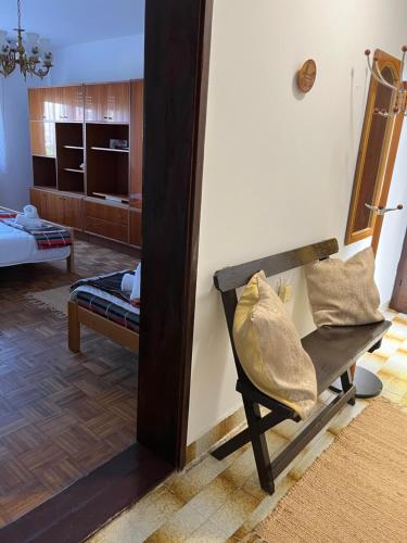a view of a living room with a chair at Loza House in Arandjelovac