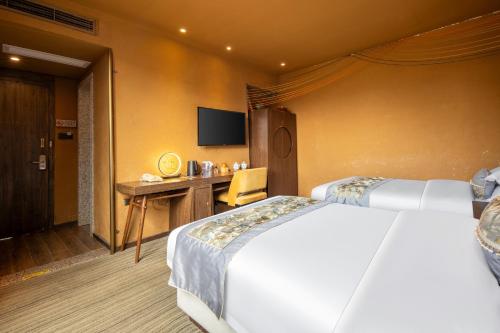 Katil atau katil-katil dalam bilik di Culture & Design-Led Boutique Hotel