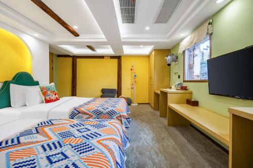 Katil atau katil-katil dalam bilik di Culture & Design-Led Boutique Hotel