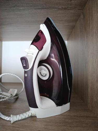 a hair dryer is sitting on a shelf at Cruz del Sur in Santa Rosa