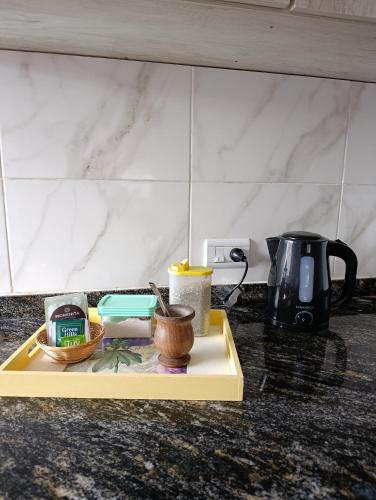 a kitchen counter with a tray with food on it at Cruz del Sur in Santa Rosa