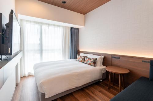 Katil atau katil-katil dalam bilik di La'gent Hotel Okinawa Naha