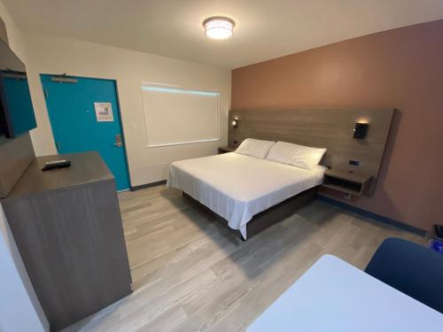 Postel nebo postele na pokoji v ubytování Rolo Beach Hotel
