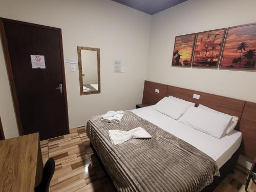 Katil atau katil-katil dalam bilik di Hotel Serra do Mar