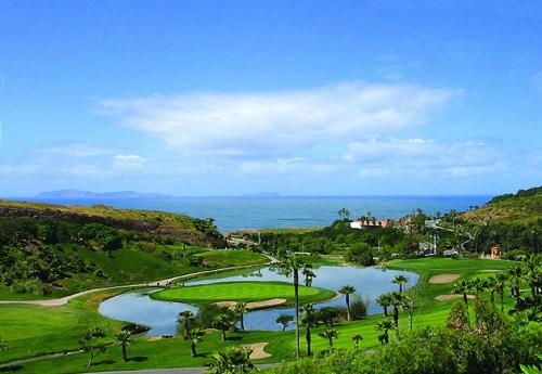 a view of a golf course with a river at Milan San Marino in Tijuana