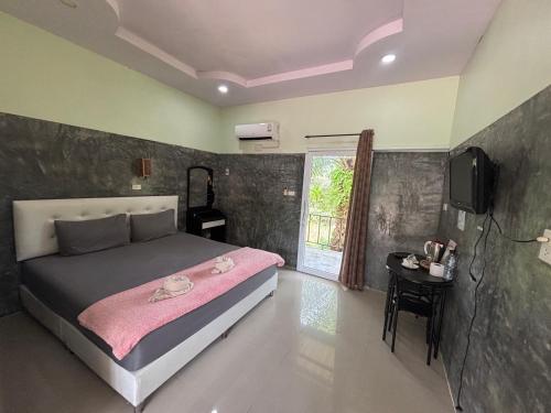 Ένα ή περισσότερα κρεβάτια σε δωμάτιο στο Thabli Resort