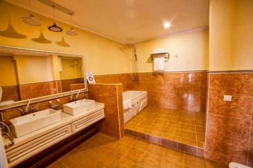 Kylpyhuone majoituspaikassa Hotel Orto Asia