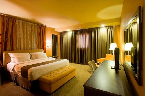 
A room at Kenari Tower Hotel
