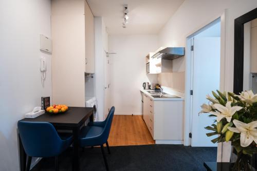 Dapur atau dapur kecil di Gilmer Apartment Hotel