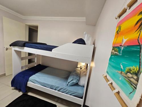 Postel nebo postele na pokoji v ubytování Cantinho Sol&Dan - 1 quarto em apto familiar