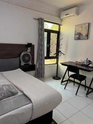 Llit o llits en una habitació de Wellness lodge 3W