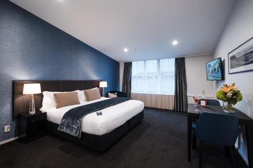 Katil atau katil-katil dalam bilik di Gilmer Apartment Hotel