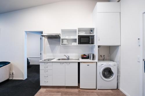 Dapur atau dapur kecil di Gilmer Apartment Hotel