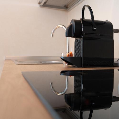 a bag sitting on top of a kitchen counter at Antica Corte Lugo in Lugo