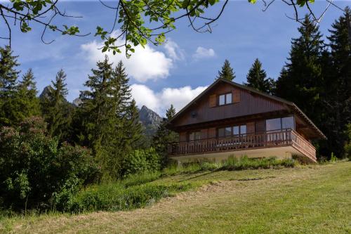 a house on a hill with trees at Au coeur des Soms en Chartreuse in Saint-Pierre-de-Chartreuse