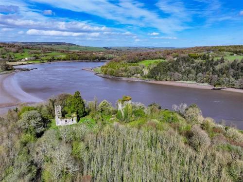 an aerial view of an island in a river at Ardsallagh, countryside retreat outside Youghal in Youghal