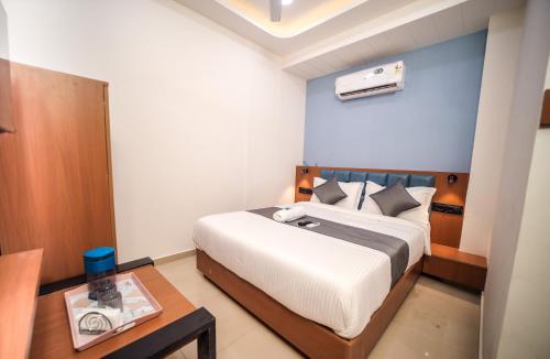 Katil atau katil-katil dalam bilik di Hotel Nest Icon